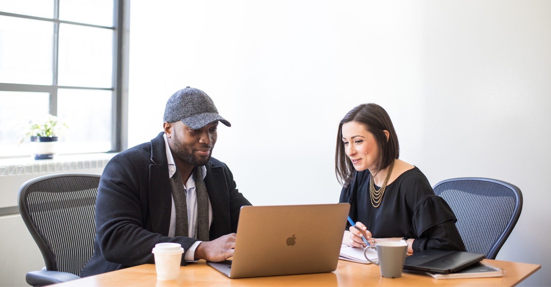 photo of lauren working in office with client