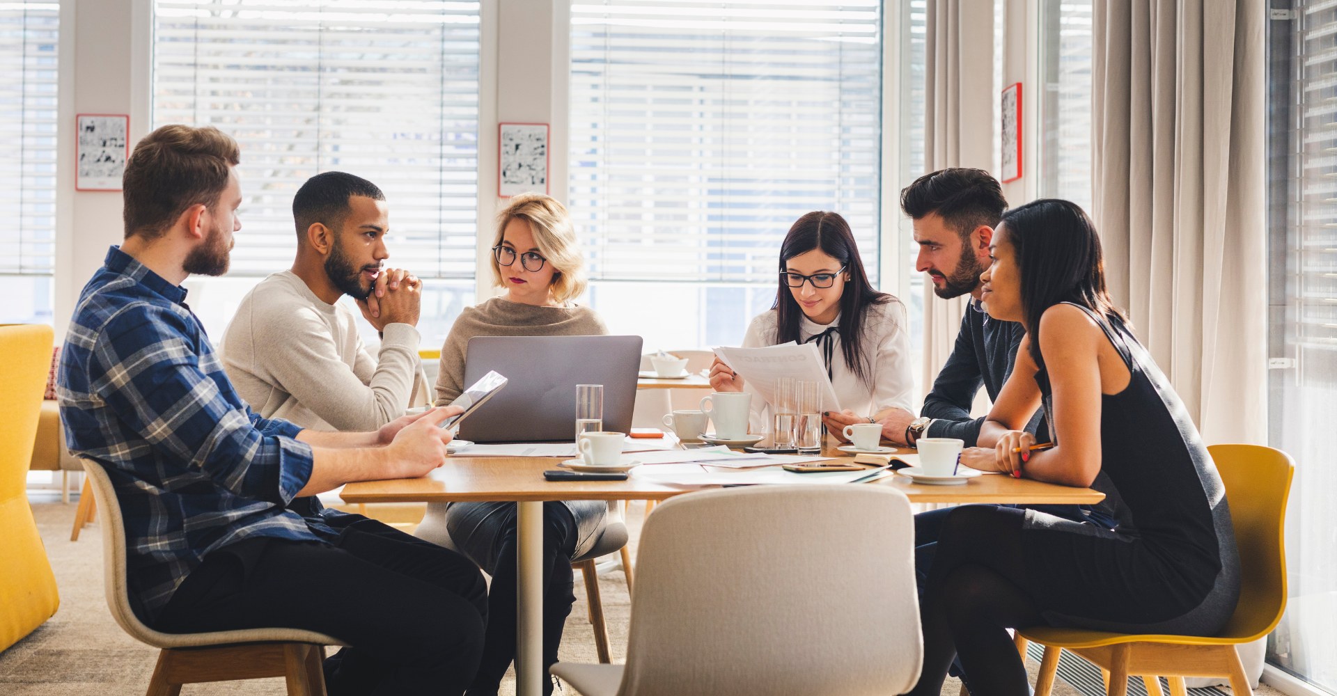 photo of team members working together